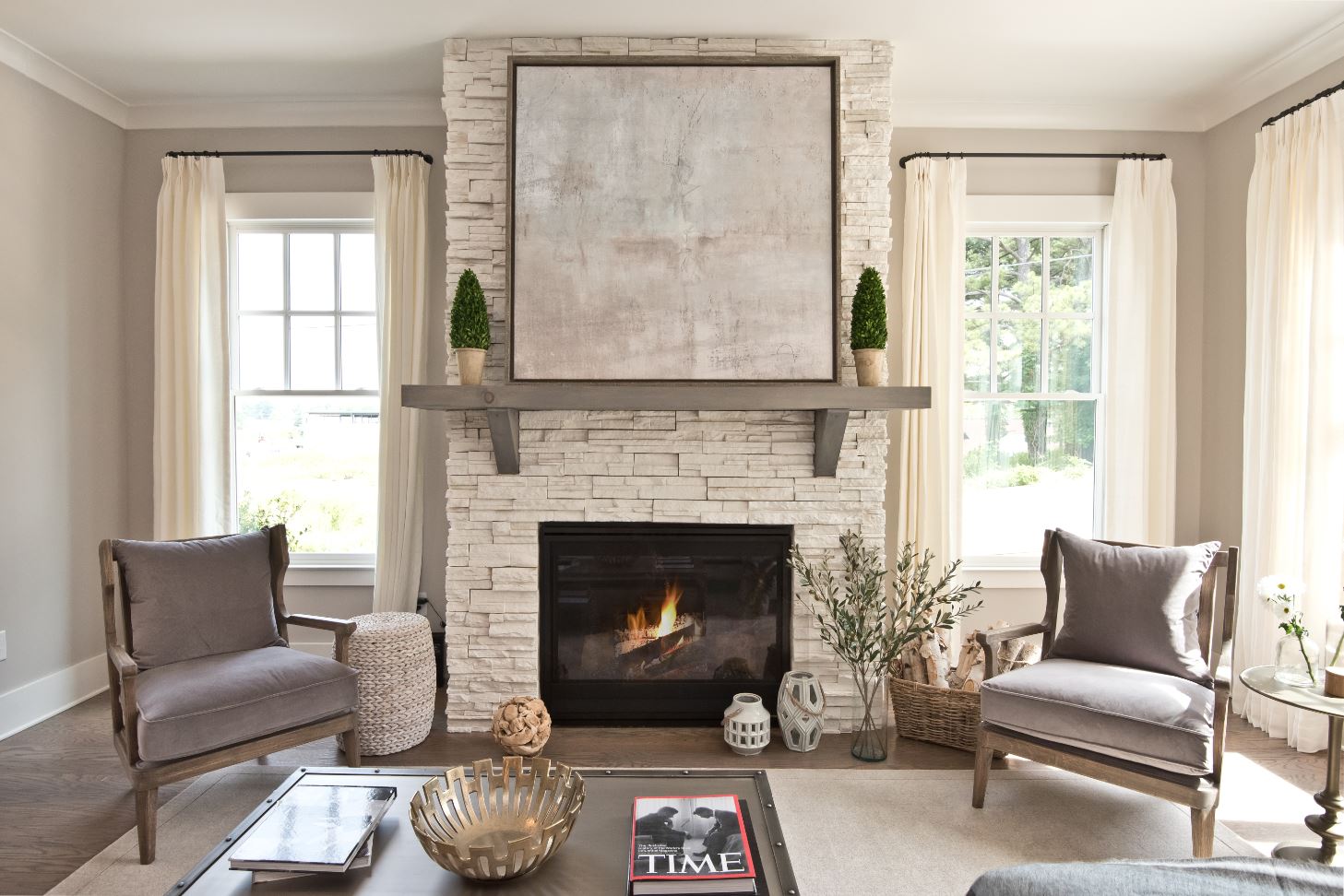 Stone and wood are a timeless design option when choosing the fireplace that's right for your new Brock Built home.