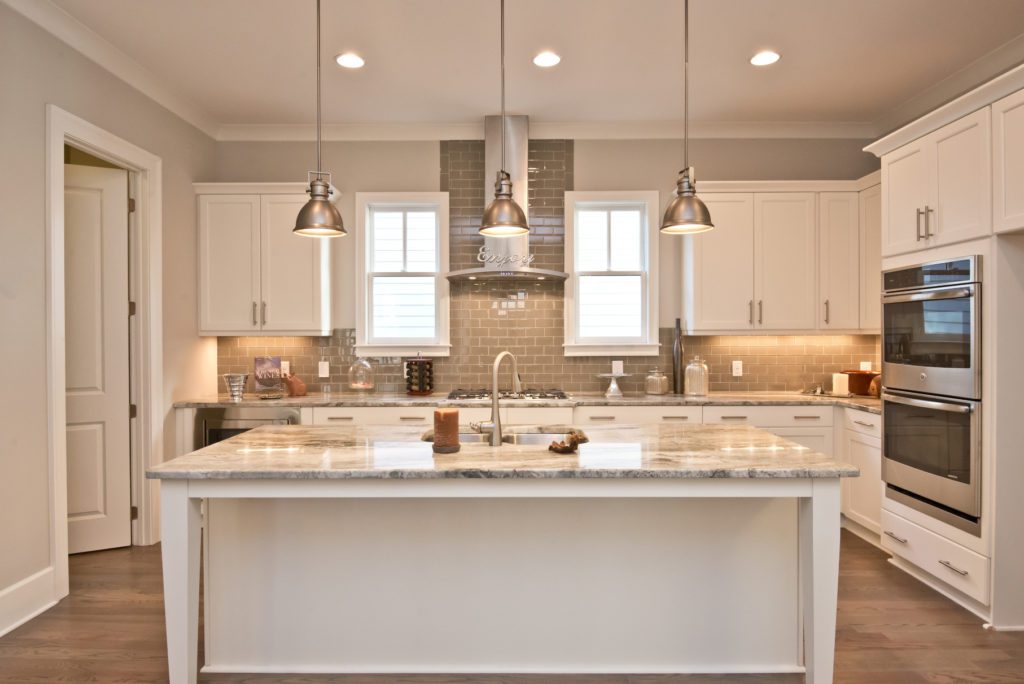 A kitchen with Energy Star appliances in a new eco-friendly home